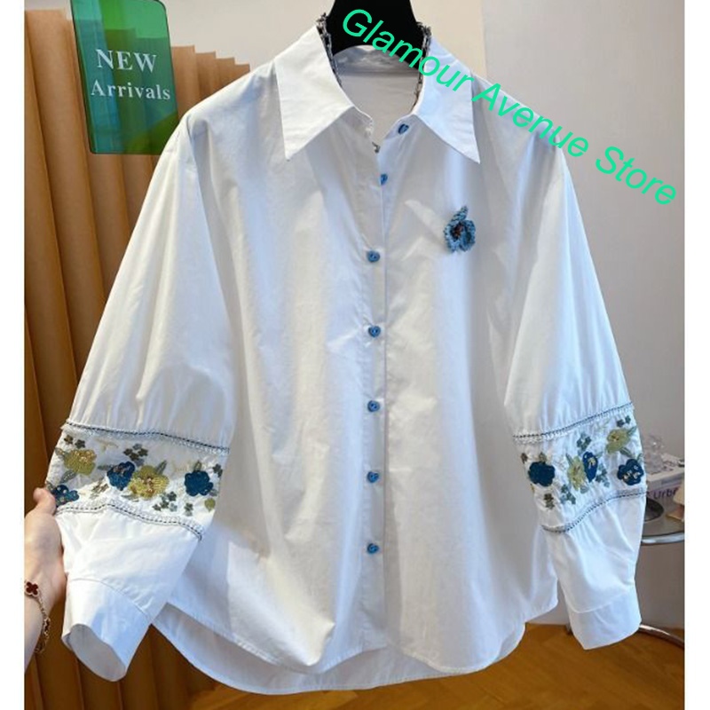 Good Floral & Wedding Decor Supply Photos - フランスの高級ブランドによる、上質な白い刺繍入りシャツ。女性向け、夏と秋に最適なゆったりとしたシルエットで、とてもおしゃれ。ボタンがアクセントになったデザイン。